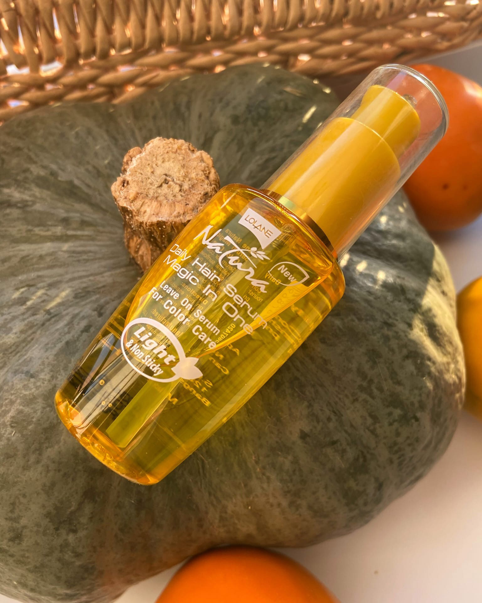 Купить сыворотку из Тайланда Лолан для окрашенных волос с Подсолнечником Lolane Natura daily hair serum magic in One For Color Care в Москве